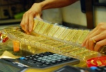 Lần đầu tiên giá vàng đấu thầu thấp kỷ lục